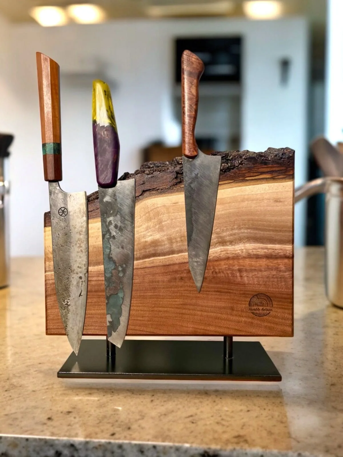Live-edge walnut magnetic knife holder with three chef knives